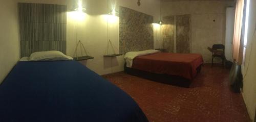 Economy Quadruple Room with Shared Bathroom