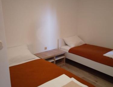 Double or Twin Room with Balcony and Garden View