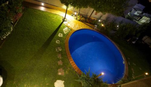 Two-Bedroom Apartment with Balcony and Pool View