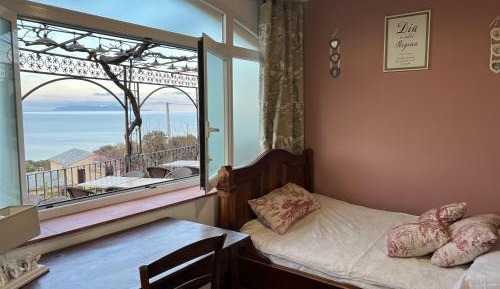 Triple Room (2 Adults + 1 Child)