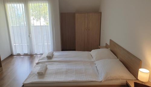 Two-Bedroom Apartment with Terrace and Lake View