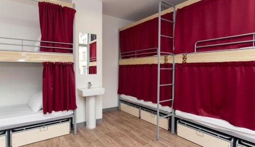Bed in 8-Bed Dormitory Room with Private Bathroom