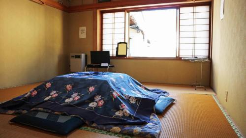 Quadruple Room with Shared Bathroom