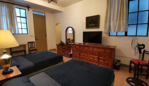 Quadruple Room with Private Bathroom