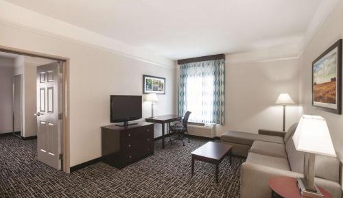 1 King Bed, Deluxe Mobility/Hearing Access Suite, Tub w/ Grab Bars, No Smoking