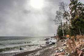 Tofte Cabin | Temperance Landing 24 is a luxury log home nestled on the edge of Lake Superior in the town of Schroeder, MN