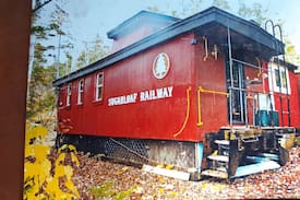 Carrabassett Valley House | -Restored caboose on Sugarloaf mountain