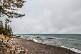 Tofte Cabin | Temperance Landing 24 is a luxury log home nestled on the edge of Lake Superior in the town of Schroeder, MN