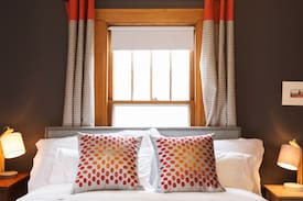 Morton Meadows House | Historic Midtown Home + Eclectic Carriage House