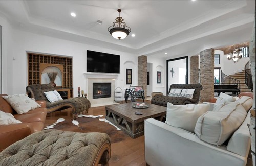 Panther Creek House | Houston Tranquil Lakefront living & Tropical Pool