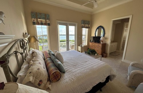 Captiva House | The best of both worlds. Gulf & Roosevelt Channle Views, Kayaks, Bikes, Dock etc