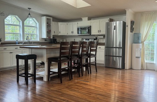 Montgomery House | Spacious house with an open floor plan. Family friendly. Serene back yard.