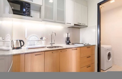 Lapu-Lapu Apartment | Two Furnished 1BRs | Amenity View, WiFi, Netflix, Pool and Beach