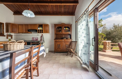Sant'Antioco Apartment | Apartment 'Ambra One' with Mountain View, Private Garden & Terrace