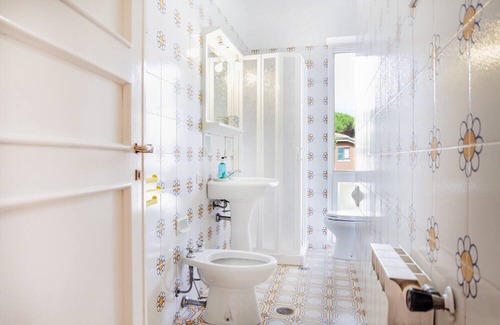 Giannella House | Holiday Home 'Residence Giannella - Robinia 16' with Shared Garden and Balcony