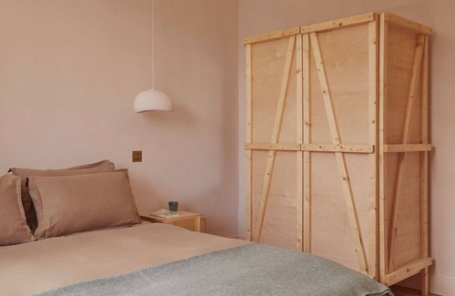 Ballycastle Apartment | Yarn - Honor is a spacious luxury suite king size bed, bathroom & living/kitchen
