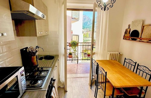 Malgrate Apartment | Cozy rustic apartment with candlelights & mountain/lake views!