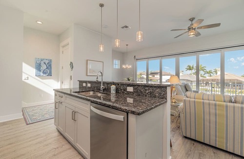 Cape Harbour Condo | 2 Story Lux Waterfront Living in Cape Harbour- Pool & Dock