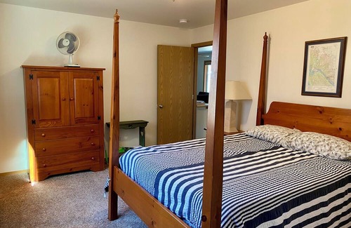 Juneau Apartment | Sunny apartment near a lake, great walking trails, and a playground on site.