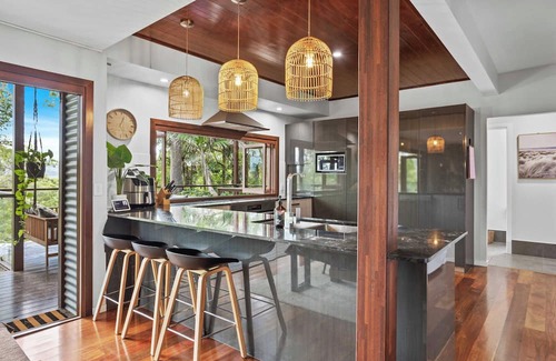Mudgeeraba House | Summerhill House is a family home nestled amongst the trees with epic hinterland sunset views