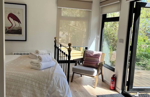 Gweek Cabin | The Mill Lodge luxury and cosy in a tranquil garden setting.
