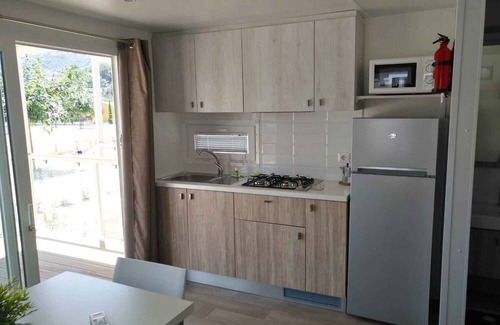 Poggi House | Mobilehome with pool and sun loungers