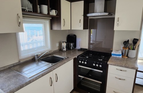 Holworth Cabin | Avon - Creek Caravan Park Ringstead - Dog Friendly