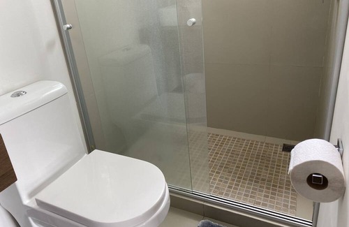 Carmen Apartment | Habitación con Baño Privado y Estacionamiento