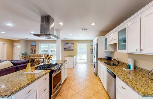 Isle of Hope Historic District House | Updated dog-friendly home with screened porch, children's items, & pellet grill