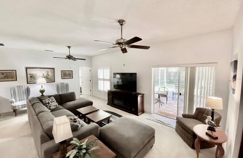 New Smyrna Beach House | Spacious home in Sugar Mill Country Club. Ten minutes to NS Beach & Flagler Ave.