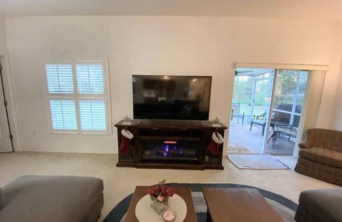 New Smyrna Beach House | Spacious home in Sugar Mill Country Club. Ten minutes to NS Beach & Flagler Ave.