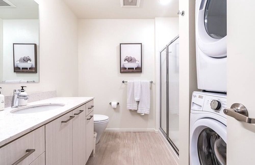 Mercer Island Apartment | Chic Mercer island Urban Bedrooms w/ Gym & Roof deck