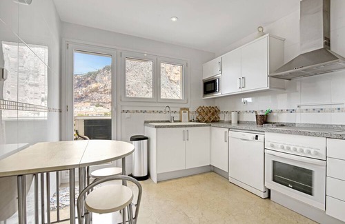 Pueblo Mascarat Apartment | Apartment 'Oasis Beach Lll' with Sea View, Wi-Fi and Air Conditioning