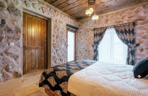 Uchisar House | Authentic Room in Cappadocia Tughan Stone House