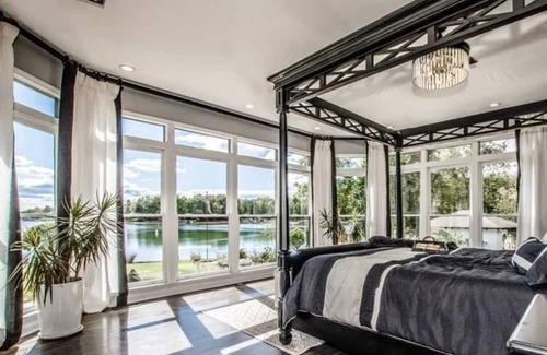 Mayhew House | New Listing! The White Lotus - Luxurious Waterfront home on Lk Norman - Pool - Private Beach - Dock