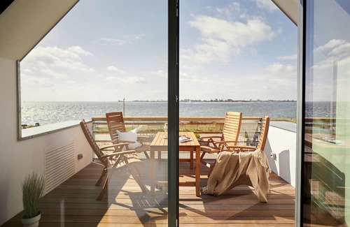 Fehmarnsund House | "Luxurious beachfront villa with sea view and sauna!"