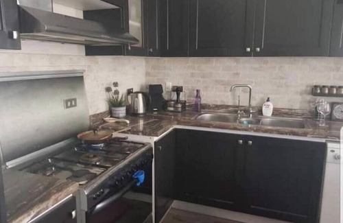 Sheikh Zayed City Apartment | 4-bedroom apartment in charming Beverly Hills with pool