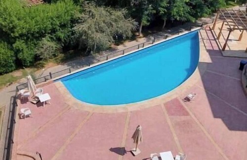 Sheikh Zayed City Apartment | 4-bedroom apartment in charming Beverly Hills with pool