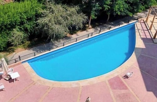 Sheikh Zayed City Apartment | 4-bedroom apartment in charming Beverly Hills with pool