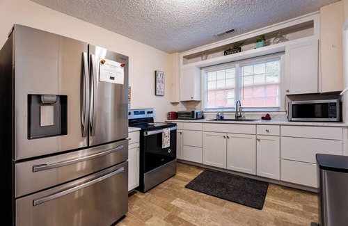 Cary House | 4BR Cape Cod Charm Walk to Cary Shops & Parks