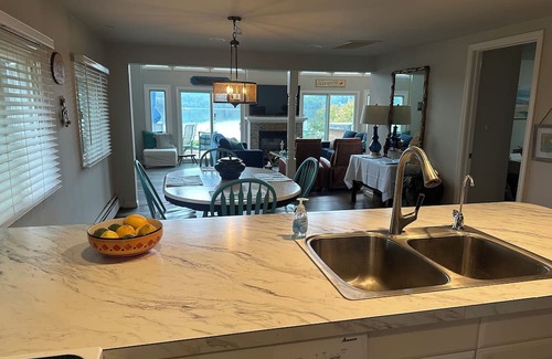 White Lake House | “Lakefront Chalet Retreat-Up North Feel, relax & rewind. Hot Tub and fireplace.”