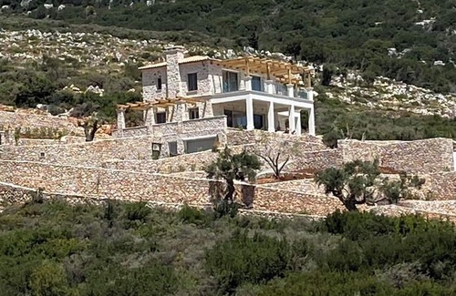 Korithi Villa | Luxury modern Villa, nestled on the mountain side with panoramic sea view.