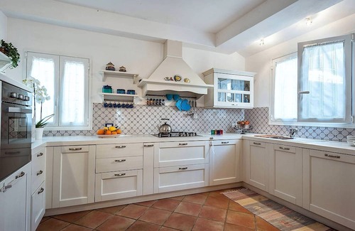 Marsala House | My Rental Homes - Casa Tika with shared pool surrounded by a wonderful garden