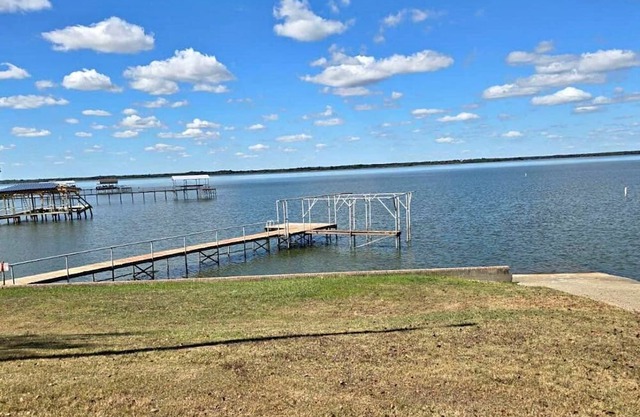 Lake house. One bedroom with walking closet. Shared bath with his/her vanity
