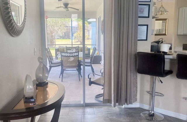 Charming 3-bedroom house with AC, fitness room, WiFi in Kissimmee