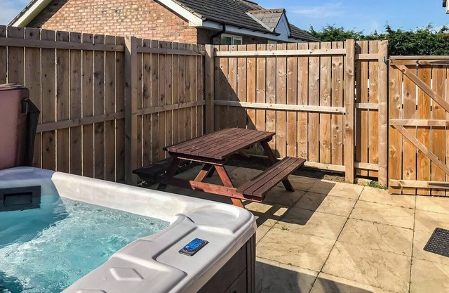 Comfortable modern cottage with one double and one with adult size bunks.