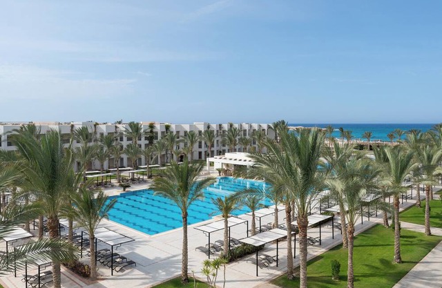 Elegant Room Space Near Almaza's Pristine Beach | with Swimming Pool & Breakfast