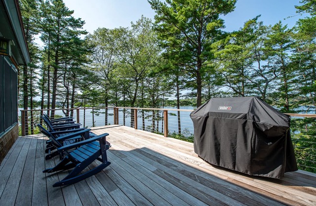 Windward Lodge, a stunning, private retreat on the Kennebec River. Seasonal dock