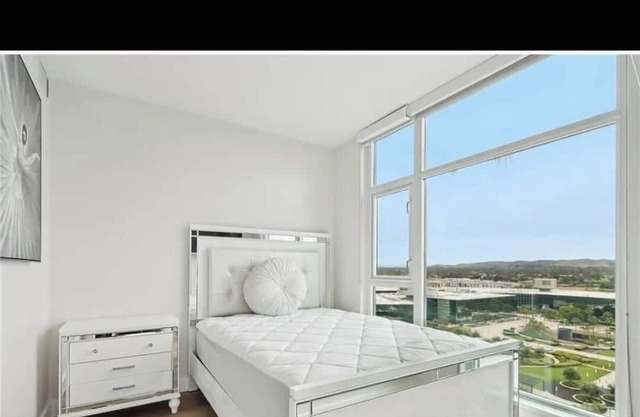 Extra luxurious high rise condo with panoramic views close to UCI and airport.