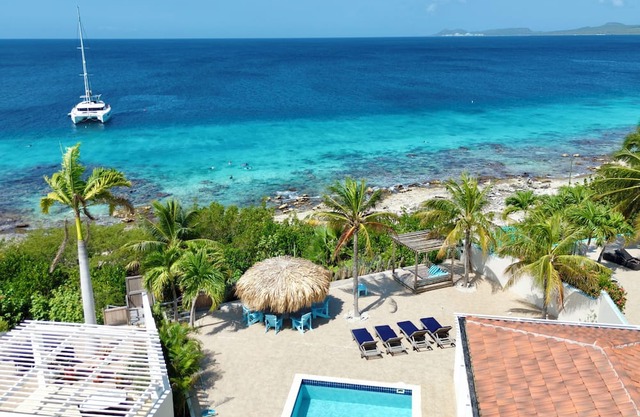Crown Ridge 12 – Oceanfront home with private pool & infant of a dive site